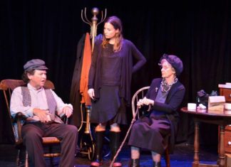 ‘Outside Mullingar’ perfect for dinner and a show - A couple of people that are sitting on a stage - Musical theatre