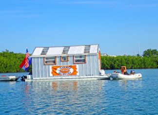 Tie-up take-out – Harbor Hillbillies open for business in Boot Key - A small boat in a body of water - Water transportation