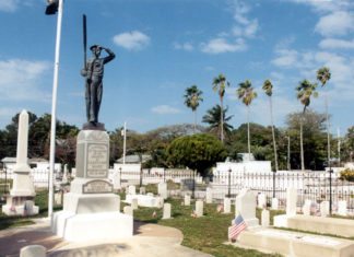 All gave some, some gave all - A large white building - Key West Cemetery