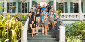 The People of Porch… and The Other Side too - A group of people standing in front of a building - Key West