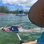 Swimming around Key West … is much easier for the kayaker - A man swimming in the water - Water