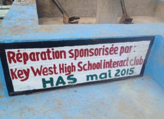 Rotarians visit Haiti - A close up of a sign - Car