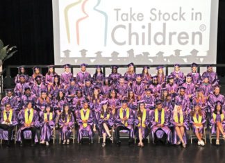 Take Stock students graduate – 50 earn full scholarships - A group of people posing for the camera - Take Stock in Children