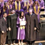 Take Stock students graduate – 50 earn full scholarships - Carlos Curbelo et al. posing for the camera - Graduation ceremony