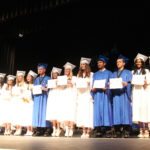 Grads receive awards – Scholarships further seniors’ education goals - A group of people performing on stage in front of a crowd - MARATHON MIDDLE HIGH SCHOOL