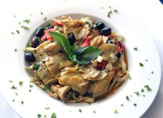 Restaurant tastes like the Mediterranean - A white plate topped with meat and vegetables - Spaghetti alla puttanesca