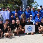 Joining forces to rebuild the reef - A group of people posing for a photo - Team