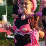 Hundreds join cancer walk - A little girl wearing a hat - Performing Arts