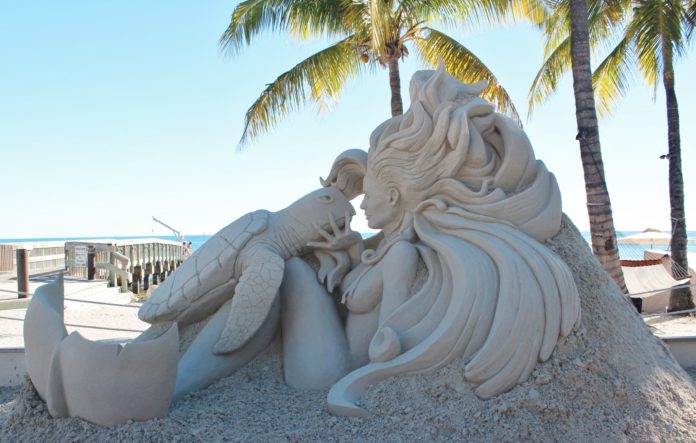 What can you do with 15,000 pounds of sand? - A statue of a person - Sculpture