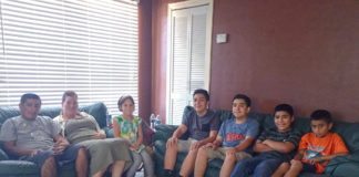 Meet the Arrietas - A group of people sitting posing for the camera - Social group