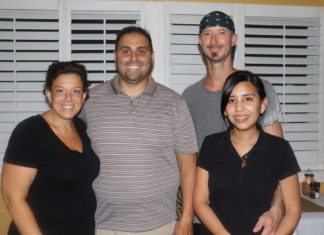 Bella Luna brings Italy to the Lower Keys - A couple of people posing for the camera - Larry Ciaffone