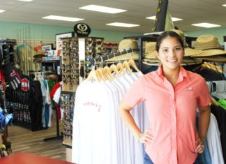 New shop features high-end fishing gear - A person standing in front of a store - The Angler's Closet