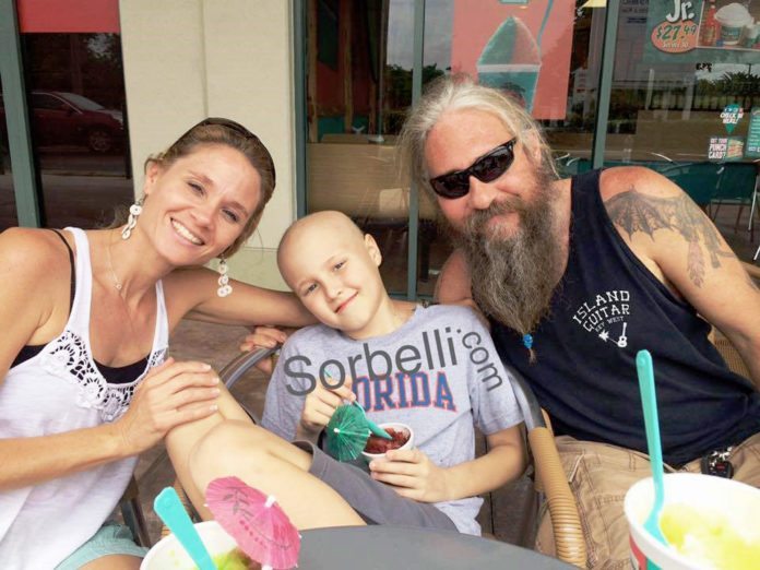 #SorbelliStrong – Local 10-year-old says he is having the best year ever - A group of people sitting at a table with a birthday cake - Coconut Grove
