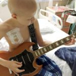 #SorbelliStrong – Local 10-year-old says he is having the best year ever - A person holding a guitar - Electric guitar