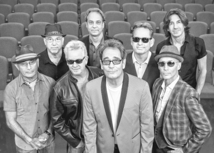 Huey Lewis coming to Key West – Concert is scheduled for early April - Huey Lewis et al. posing for a photo - Huey Lewis and the News
