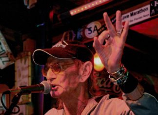 Goodbye, Rocketman – Middle Keys entertainer passes away - A man standing on a stage - Concert