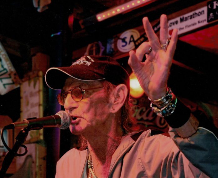 Goodbye, Rocketman – Middle Keys entertainer passes away - A man standing on a stage - Concert