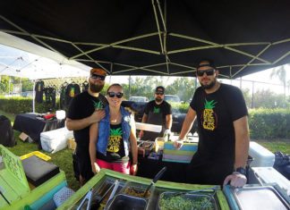 There’s a new catering crew in town – Irie Island Eats gaining momentum - A group of people posing for the camera - Irie Island Eats