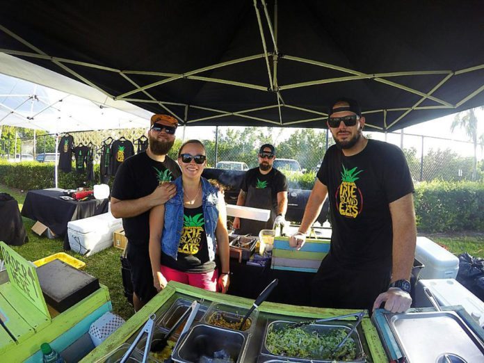 There’s a new catering crew in town – Irie Island Eats gaining momentum - A group of people posing for the camera - Irie Island Eats