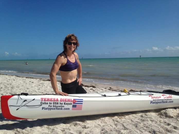 Kayaker plans Cuba to Key West - A person sitting at a beach - Kayak