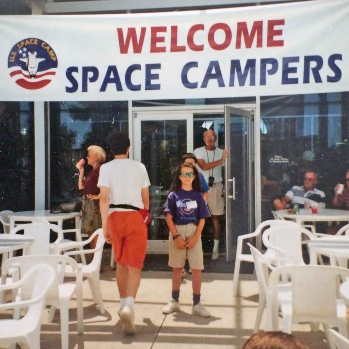 Space: the journey starts in Key West - A group of people walking in front of a store - Space Camp