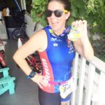 Space: the journey starts in Key West - A woman sitting on a table - Triathlon