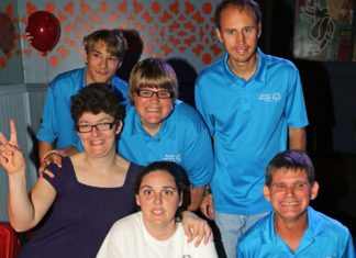 Special Olympics Monroe County reaps rewards at happy hour - A group of people posing for a photo - Social group