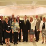 Keys contingent speak with state leaders - Dr. Randy A. Fink, Jeff Atwater posing for a photo - Islamorada