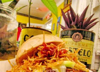 Frita’s is like a visit to abuela’s backyard - A plate of food on a table - Vegetarian cuisine
