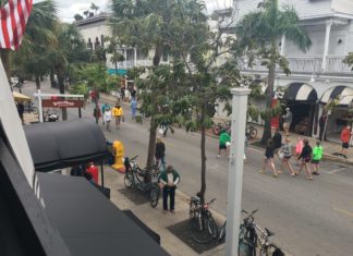 Gas Monkey Bar N’ Grill serves up music and more - A group of people walking down the street - Gas Monkey Bar N' Grill