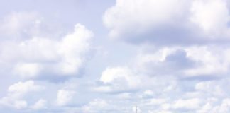 A Jet Ski tour can make a local feel like it’s the very first time - A person riding a surf board on a body of water - Personal watercraft