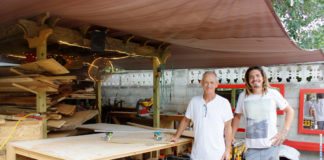 Handcrafted Skateboards are made in Key West - A man standing in a kitchen preparing food - Key West