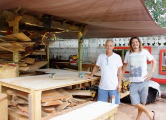 Handcrafted Skateboards are made in Key West - A man standing in a kitchen preparing food - Key West