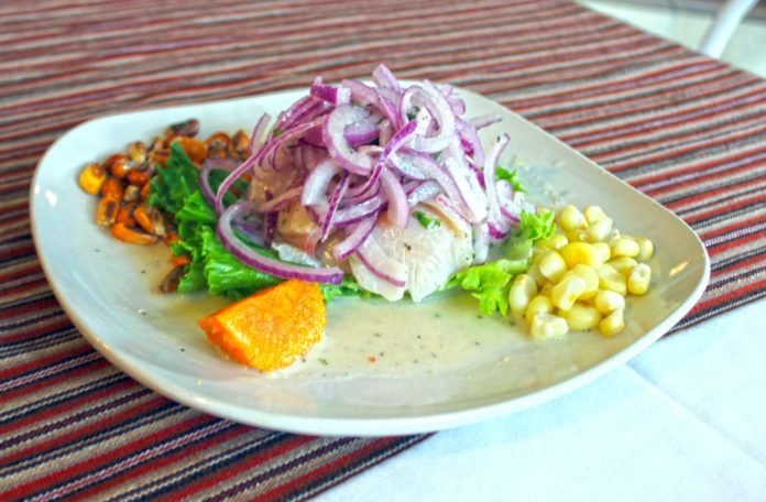 Inca’s is a Peruvian experience - A plate of food on a table - Incas Restaurant