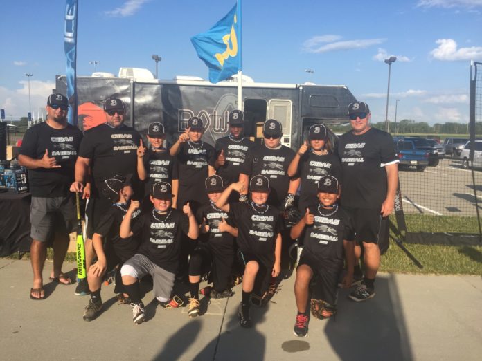 Baseball dads take on Omaha with Lower Keys Barracudas - A group of people posing for the camera - Car