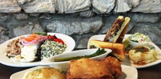 Overseas Pub and Grill re-opens doors after ‘home-y’ renovation - A plate of food on a table - Fried chicken