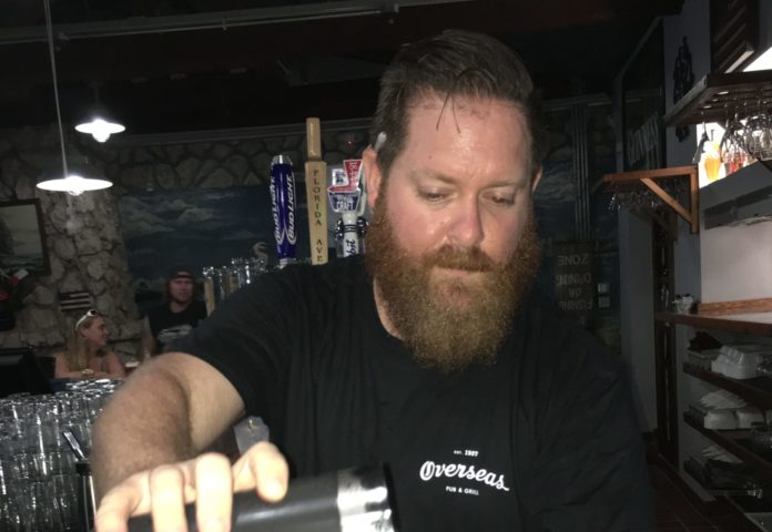 Andy at Overseas Pub and Grill - A man in a black shirt - Alcoholic Beverages