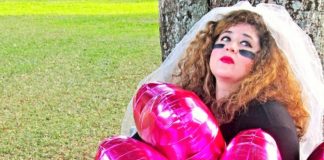 One Woman Show: ‘The Wedding Warrior’ in Islamorada - A girl is sitting in the grass - Girl