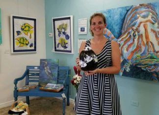 Purple Pumpkins: Art auction and gala raise funds for Rett Syndrome - Michelle Lowe standing in a room - Art