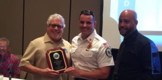High marks: Marathon paramedic presented state award - A group of people holding wine glasses - Marathon Fire Department