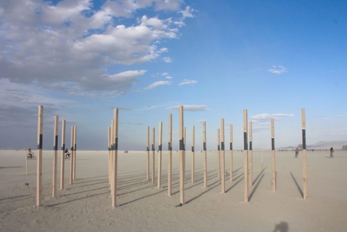 DUST & FAME: Artist Tyler Buckheim wows at Burning Man - A close up of a sandy beach - Burning Man