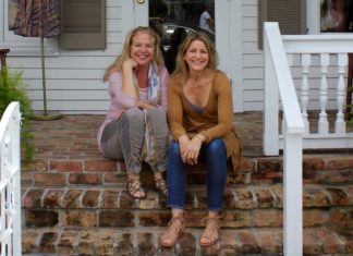 VIGNETTE: Good friends open new boutique - A person sitting on a bench in front of a building - Duval Street