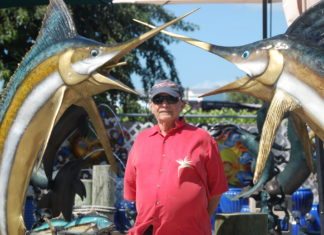 A metal casting call - A statue of a man - CAPTAINS IMPORTS INC