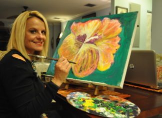 Artist Spotlight – Debbie Hess - A person holding a birthday cake - Painting