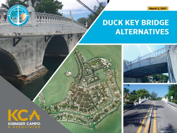 Talk focuses on Duck Key bridges - A sign on the side of a building - Florida Keys