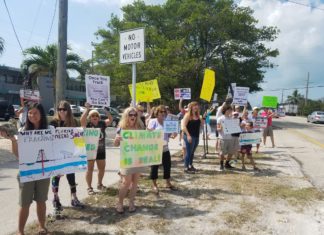 Future of Fracking in Florida - A group of people holding a sign - Protest