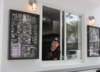 Mary Ellen’s: Say cheese, grilled cheese - A person standing in front of a window - Mary Ellen's Bar & Restaurant