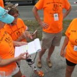 Cow Key Bridge Run: Show us your teats - A group of people in orange shirts - Ultramarathon