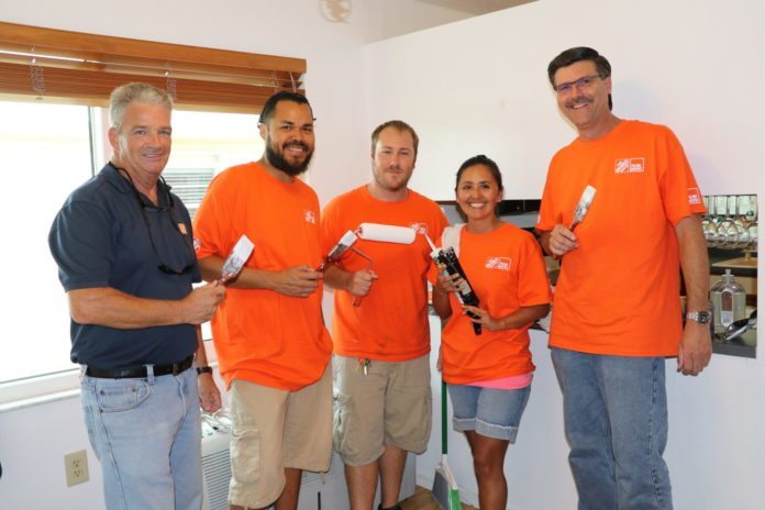 Team Depot helps local veterans - A group of people posing for the camera - T-shirt