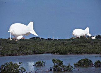 Fat Albert has a baby in the skies over Lower Keys - A flock of seagulls flying over a body of water - Cudjoe Key